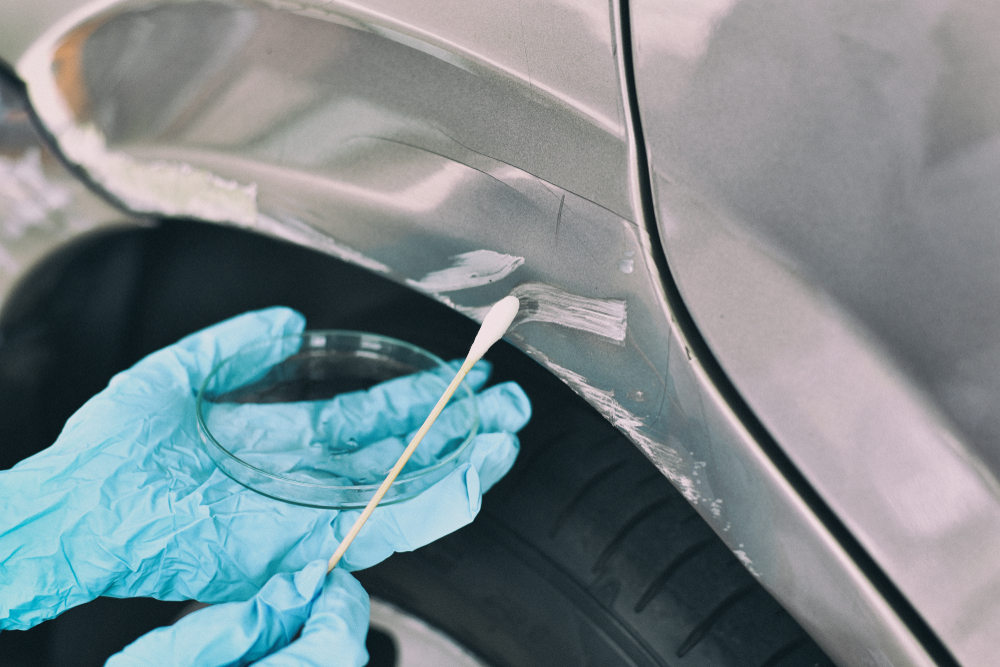Forensic evidence collection from a vehicle after an incident, illustrating investigations supported by Greenville criminal defense lawyers.